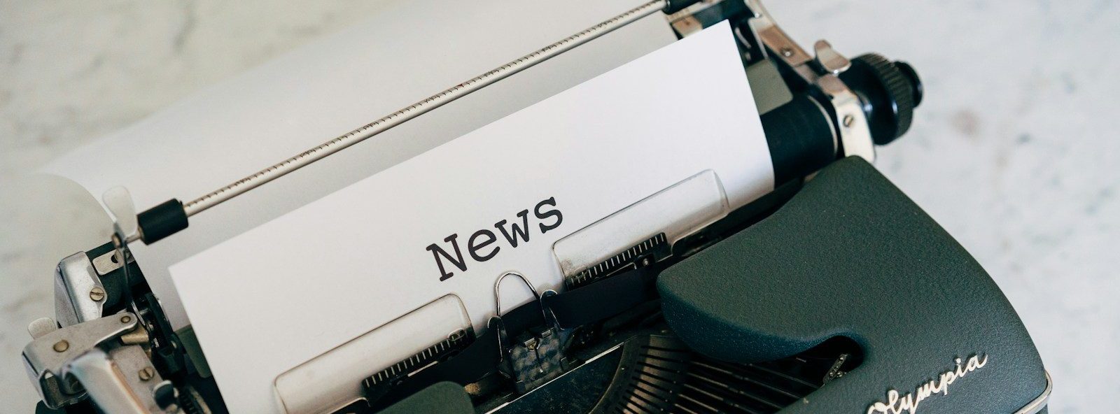 a close up of an old fashioned typewriter